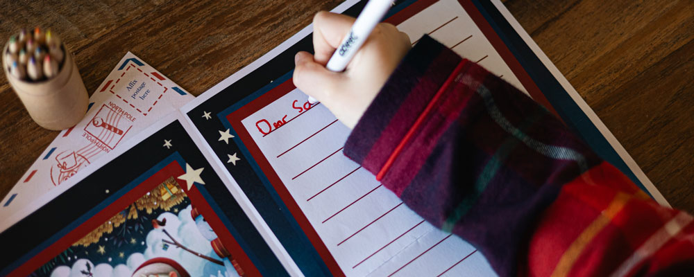 Writing a letter to Santa. Dear Santa